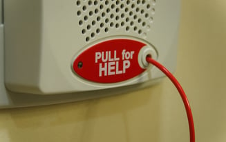 Pull for help system on wall