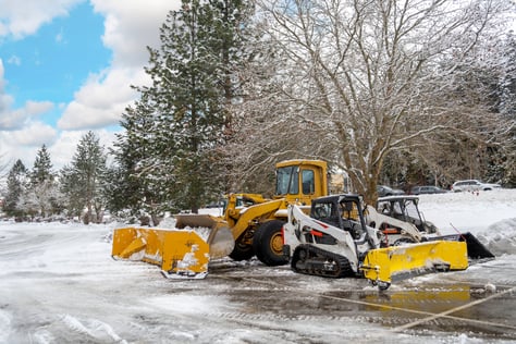 Heavy machinery in parking lot