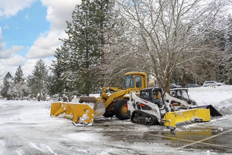 Heavy machinery in parking lot