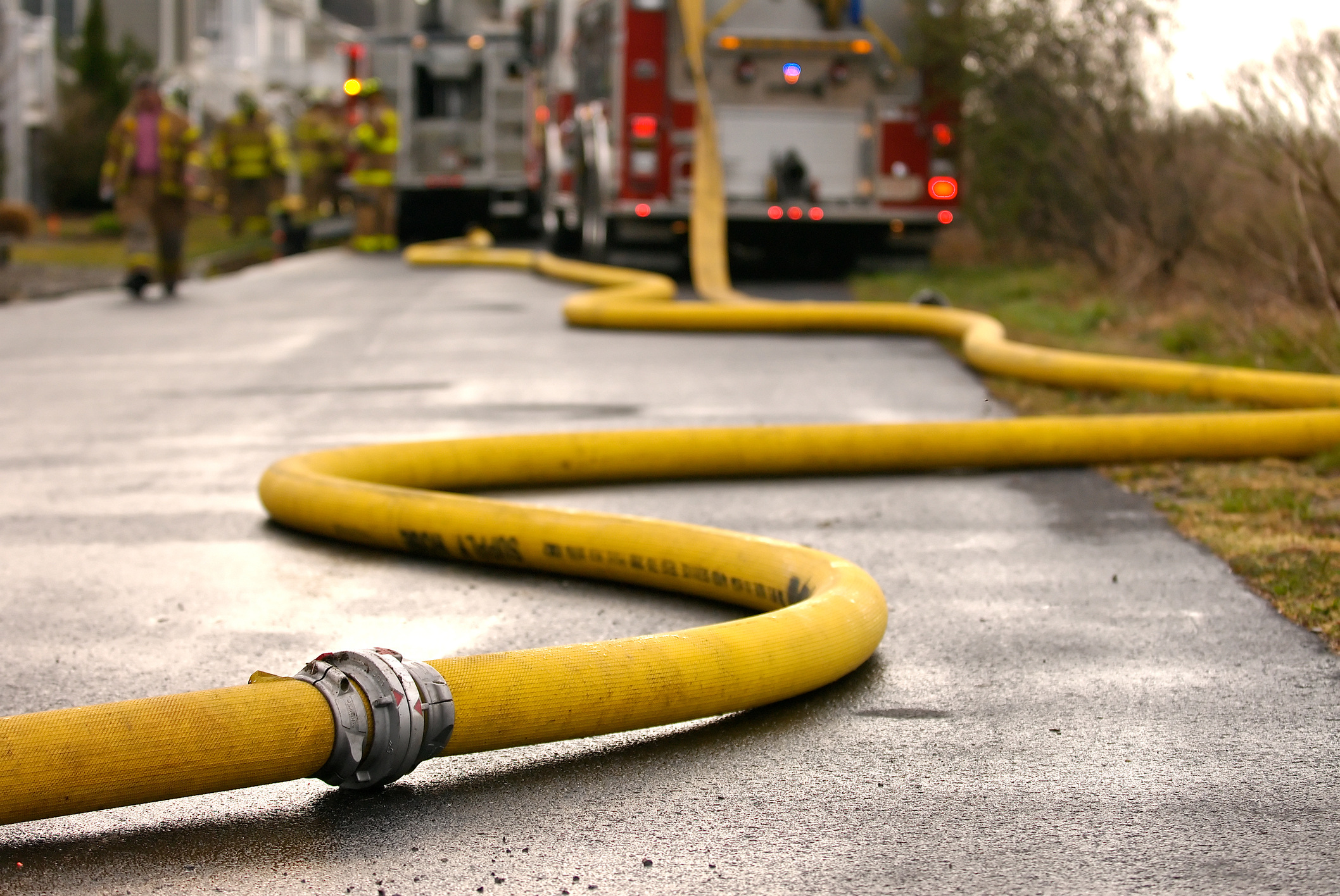 Fire house snaking from a fire engine