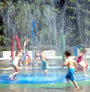Playing in splash pad