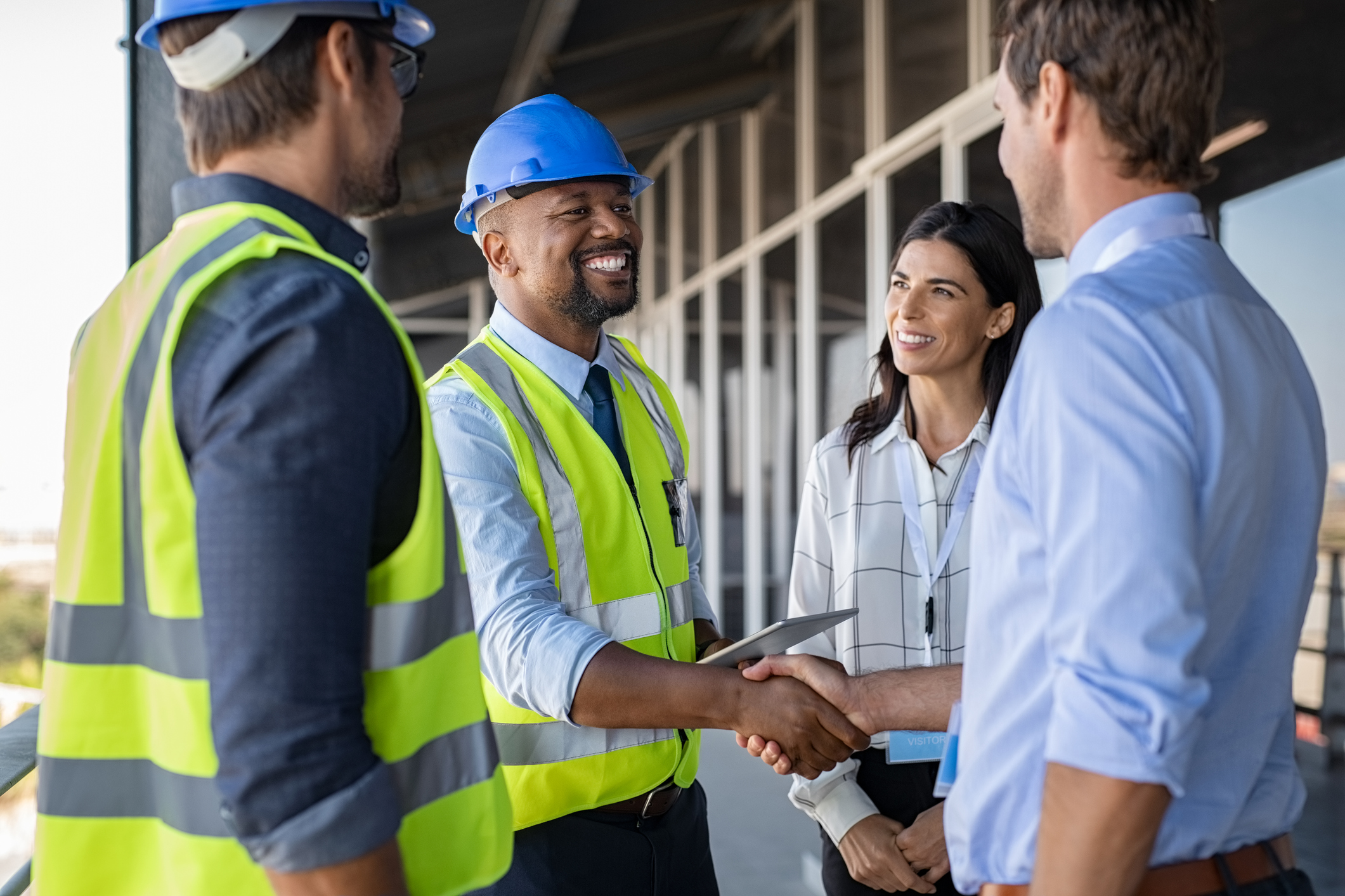 Contractor shaking hands with man